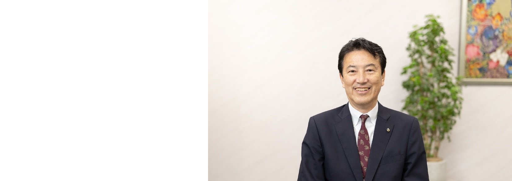 写真　社長着席３　横長　20250626.jpg